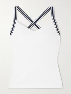 Designed for hot days on the tennis court, Tory Sport's tank is made from moisture-wicking stretch-jersey and paneled with breathable mesh at the sides. It has a supportive built-in shelf bra and contrasting grosgrain racerback straps that allow full range of movement. Wear yours with one of the label's skirts. Fitted Tennis Tops For Summer, Sporty Tennis Tops For Summer, Sporty Summer Tennis Tops, Fitted White Tank Top With Contrast Trim, Sporty Tank Top With Contrast Trim, White Fitted Tank Top With Contrast Trim, Sporty Tennis Dress With Contrast Trim For Summer, Sporty Summer Tennis Dress With Contrast Trim, Summer Sports Top With Contrast Stripes