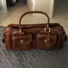 Beautiful Brown Vintage Coach Bag Probably Over 20 Years Old! I Had A Hard Time Parting With This Beauty But Want Someone To Love It As Much As Me! Two Front Pockets And Two Side Pockets . There Is Distress On The Bad Due To The Soft Leather. Beige Detail Stitching And Gold Hardware Make This Gorgeous! Inside Has The Original Satin Lining In Great Condition! 15.5 Wide By 5 Across And 5.5 Tall Bag Shelf, Thrift List, Vintage Coach Bag, Vintage Coach Bags, Brown Handbag, Brown Vintage, Coach Bag, Hard Time, Vintage Coach