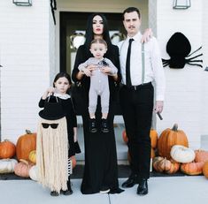 the family is dressed up for halloween