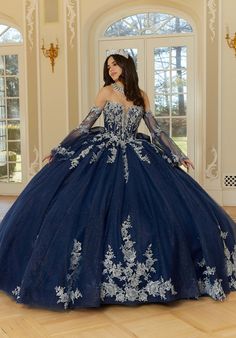 Quncie Dresses With Sleeves, Sweet 16 Dresses Blue Royal, Royal Blue Gown For Debut, Quinceanera Dresses Navy Blue And Silver, Metallic Dark Blue Quince Dress, Dusty Blue Quince Dress, Celestial Quinceanera Dress, Navy Blue Quince Dress With Silver, Dark Blue Dress Quinceanera