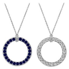 A unique pendant necklace, showcasing round brilliant cut diamonds weighing 1.60 carats total on one side, and round cut blue sapphires weighing 1.80 carats total on the other side. Finely made with 18K white gold. Attached to an 18 inches adjustable white gold chain.  Roman Malakov is a custom house, specializing in creating anything you can imagine. If you would like to receive a special quote on a custom piece, please message or call us. Sapphire Diamond Pendant, Diamond Circle Pendant, Blue Sapphire Pendant, Sapphire Necklace Pendants, Peacock Pendant, Blue Sapphire Necklace, Unique Pendant Necklace, White Gold Chain, Round Sapphire