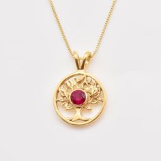 Ruby Tree of Life Pendant set with a Created Ruby in top grade, perfect diamond cut & intense red color.Gold Vermeil - 18K Gold plating over Solid 925 Sterling Silver.Matching Ring & Earrings - please ask meDetails:• Created Ruby in a flawless clarity• Ruby: 5mm, 0.5 Ct, round cut• Dimensions: Pendant Height 23.5mm, Width 16.5mm• Free Complimentary Chain• 18k Gold VermeilSKU 2849 Red Sterling Silver Birthstone Necklace For Anniversary, Diamond-cut Ruby Jewelry As Gift, Diamond-cut Ruby Jewelry For Gifts, Diamond Cut Ruby Jewelry As Gift, Yellow Gold Jewelry With Lab-created Ruby For Gift, Lab-created Ruby Birthstone Jewelry Gift, Lab-created Ruby Jewelry Gift With Round Stone, Red Birthstone Necklace For Anniversary, Gift Jewelry With Lab-created Ruby In Round Cut