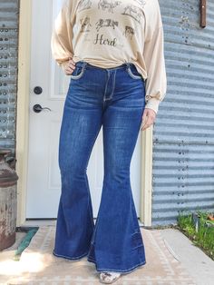 These embroidered dark wash flares are show stoppers! They have great stretch for all day comfort. Embroidered details on the back pockets and complimenting top stitching along the unfinished hem. Detail stitch work. 2 button back pockets. 2 front pockets. 67% Cotton/27.5% Polyester/3.5% Elastane/2% Viscose 33" Inseam Socks For Flats, Dark Wash Flare Jeans, Stitch Work, Embroidered Details, Top Stitching, Long Sleeve Cardigan, Bottoms Pants, Flare Jeans, Sweater Hoodie