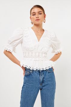 Add some romance to your style with this captivating combination lace top. With a v neckline and half sleeves, this top is perfect for dressing up or down. The hidden zipper gives you a touch of sexiness, while the cropping peplum hem adds a touch of femininity. Pair it with your favorite jeans or skirt and wear it out on the town. You'll love feeling romantic and sexy in our Ever Romantic Combination Lace Top. Combination lace V neckline Zipper Non sheer Lining Half sleeves Cropped peplum Shell Feminine V-neck Tops With Lace Sleeves, Elegant V-neck Crochet Top With Lace Trim, Elegant Fitted V-neck Crochet Top, Feminine V-neck Top With Lace Sleeves, Elegant Crochet V-neck Top With Lace Trim, Elegant Lace Crochet V-neck Top, Elegant Short Sleeve Crochet Top With Lace Trim, Elegant Crochet Top With Lace Trim And Short Sleeves, Chic V-neck Lace Crochet Top