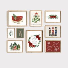 six framed christmas cards on a wall