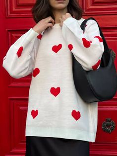 Get ready to fall in love with the Bella Road Heart Round Neck Dropped Shoulder Sweater. With a cozy dropped shoulder design and a cute heart detailing, this sweater is perfect for adding a touch of sweetness to any outfit. Stay warm and stylish in this must-have sweater. 😍😍   Features: Basic style  Stretch: Slightly stretchy  Material composition: 65% polyester, 35% acrylic  Care instructions: Machine wash cold. Tumble dry low.  Imported   Size Top Length Bust Shoulder Sleeve Length One Size 24.4 43.3 20.9 18.5 Elegant Sweater, Chunky Knits, Embroidery Sweater, Cozy Coats, Heart Sweater, Mode Casual, Embroidered Heart, Drop Shoulder Sweaters, Round Neck Sweaters