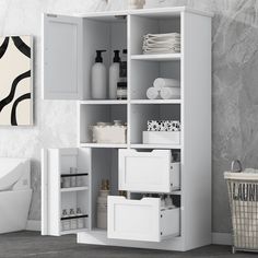 a white cabinet with many items in it