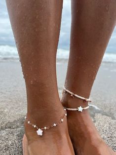 "Stunning Fresh Water white pearl anklet with a hand carved pink Peruvian Opal Star center.  It will instantly become your Summer staple! Also available with a Rainbow Moonstone Star center and an Aquamarine Star center.  Please make your selection from the drop down menu. Anklet on model measures 8\" with a 1\" extension chain.  Please make your chain length selection from the drop-down menu.  *Available in Sterling Silver, Rose Gold filled. and Gold Filled This listing is for the Vide Star Anklet ONLY.  All other anklets are sold separately.  * All photos are property of TatiRocks Jewelry. Use of these photos is prohibited unless permission is granted by TatiRocks Jewelry." White Starfish Charm Anklet For Beach, White Beach Anklets With Starfish Charm, White Starfish Anklets For Beach, White Ankle Wrap Anklets For Beach, Adjustable White Starfish Anklets, White Starfish Anklets As Gift, White Starfish Anklets For Gift, White Ankle Strap Bracelet For Gifts, White Ankle Strap Anklets As Gift