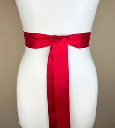 Narrow Red Sash, Red Satin Sash  Bridesmaid Sash, Red Wedding Dress Sash  Bridal Sash, Bright Red Satin Sash Belt  Satin Swank Now in a narrow version, this Satin Swank® waist sash is the perfect finishing touch for your wedding, bridesmaid, or special occasion dress, or just the right piece to add instant polish to your dress or top.   Depending on your waist size and the length you choose, you can wrap the sash around your waist once or up to three times. You decide whether to tie the sash in a bow or a simple knot with long-hanging tails. Tie in front, in back, or on the side. Luxury charmeuse satin fabric in bright true red on both sides means there is no wrong side of the sash peeking through, resulting in the perfect finishing touch for your special occasion that you also can continu Satin Sash With Bow For Bridesmaids, Bridesmaid Sash With Satin Bow, Bridesmaid Satin Sash With Satin Bow, Bridesmaid Satin Sash With Bow, Satin Sashes For Bridesmaids, Elegant Red Wedding Sash, Elegant Red Sash For Party, Elegant Red Party Sash, Red Wedding Accents