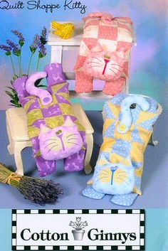 three stuffed animals sitting on top of a wooden bench next to lavenders and flowers