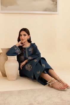 Batik Embroidered Lawn Dress Adira 2Pc Embrace tradition with our Pakistani outfits online. This ready-to-wear 2Pc dress in premium Pima lawn features a straight fit shirt with an embroidered neckline and composed motifs. The loose fit sleeves are adorned with embroidered borders and lace. Paired with embroidered cambric culottes, it captures the essence of celebration. Premium Pima lawn Embroidered neckline Straight fit shirt Embroidered cambric culottes Note: Colors may slightly vary due to li Blue Long Sleeve Palazzo Set With Floral Embroidery, Indigo Traditional Wear For Eid, Traditional Indigo Sets With Resham Embroidery, Blue Palazzo Set With Intricate Embroidery And Long Sleeves, Blue Palazzo Set With Intricate Embroidery, Indigo Sets With Resham Embroidery For Eid, Indigo Zari Work Sets For Eid, Blue Long Sleeve Palazzo Set With Intricate Embroidery, Eid Indigo Sets With Resham Embroidery