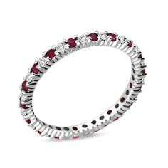 Celebrate your anniversary or any special occasion with this spectacular gemstone and diamond eternity band. Crafted in exquisite platinum, this sleek and streamlined design sparkles with alternating bright red rubies and dazzling diamonds. Radiant with 1/4 ct. t.w. of diamonds and a brilliant buffed luster, this slender anniversary band conveys your everlasting love. Elegant Red Ruby Eternity Band, Elegant Red Round Eternity Band, Elegant Red Round Cut Eternity Band, Elegant Red Eternity Band For Anniversary, Red Ruby Ring With Channel Set Diamonds, Red Round Eternity Band For Formal Occasions, Red Eternity Band With Prong Setting, Red Round Eternity Band With Prong Setting, Red Round Eternity Band For Anniversary