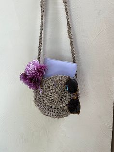 Hello! Thanks for Stopping by. This bag is a cute, crocheted, and Eco-friendly plarn bag perfect to go along with all of your spring and summer outfits. It is the perfect size to carry the essentials to the store, down the boardwalk, to dinner or to brunch, and everywhere in between. Most importantly, this bag helps to give disposable bags a second life and a new purpose. Approximate size* Body: 6 1/2 in (16 cm) diameter, 3 in (7 cm) side panel Strap: 46 in (117 cm) *Disclaimer: All of my products are handmade and as such may vary slightly in exact size. The process of making these bags starts with a big stack of grocery bags. The bags are then cut and knotted to form plarn (plastic yarn). This plarn can then be crocheted into coasters, key chains, and all kinds of bags and anything else y Plarn Bags, Plastic Yarn, Spring And Summer Outfits, Grocery Bags, Grocery Bag, Second Life, Panel Siding, Plastic Bag, Cross Body Handbags