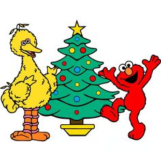 the sesame street christmas tree is next to an elm and elm character in front of it