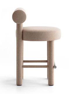 an upholstered stool with wheels on the back and seat is shown in front of a white background