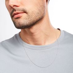 Enjoy a versatile design that complements every style and occasion - this simple and elegant white gold Singapore chain necklace from the Made in Italy Collection. Crafted in 14K white gold This 1.0mm-wide Singapore chain is certain to become your favorite go-to look. Lovely worn alone or layered with other chains, necklaces and pendants This necklace adjusts up to 22.0 inches in length with a sliding bead extender and secures with a lobster claw clasp. Chains Necklaces, Lobster Claw, Singapore, Chain Necklace, In Italy, White Gold, Necklaces, Italy, Chain