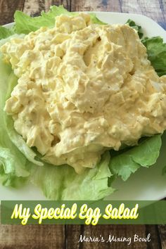 a plate with lettuce and egg salad on it that says, my special egg salad