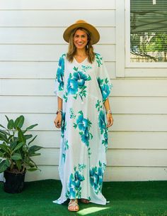 Embrace the essence of summer with our Hibiscus Floral Boho Kaftan Dress. This handmade kaftan, ideal for beachwear, loungewear, and as a swimsuit cover-up, captures the tropical Hawaiian vibe. Crafted from premium rayon, it promises comfort and style in equal measure.  Features ‣ Boho/Hippie/Hawaiian/Beach/Tropical Theme: Perfect for a relaxed, stylish look suitable for various occasions. ‣ Loose Fit: Designed to provide maximum comfort with a relaxed fit. ‣ Adjustable Rope: Features an adjusta Floral Print Flowy Maxi Cover-up, Beachy Maxi Dress With Tropical Print For Beach Cover-up, Tropical V-neck Maxi Dress For The Beach, Floral Print V-neck Cover-up For Vacation, Tropical V-neck Kaftan For Beach Cover-up, Tropical V-neck Kaftan For Summer, Hawaiian V-neck Vacation Dress, V-neck Floral Print Beach Dress, Tropical Dresses With Tropical Print For Beach