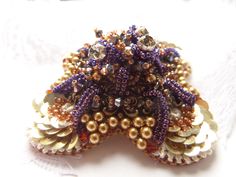 OOAK, shiny golden beaded multi-layer luxury fantasy flower brooch ... like from  the Queens jewelry box. Decorated with vintage sequins and vintage lace, Swarovski crystals and pearls, tiny Japanese seed beads, this beaded brooch is one of a kind and entirely hand-crafted by me. Dimension of the brooch: 65 mm x 70 mm. Finished with the natural leader. Ready to ship. Visit my shop home to see other items: https://www.etsy.com/shop/AurielaDesign Visit my shop home to see other brooches: https://w Elegant Gold Embellished Brooches, Bohemian Beaded Brooch For Party, Bohemian Beaded Brooches For Parties, Bohemian Gold Brooches For Gifts, Handmade Bohemian Gold Brooches, Bohemian Handmade Gold Brooches, Unique Beaded Brooches For Wedding, Gold Embellished Wedding Brooches, Bohemian Gold Brooches For Wedding