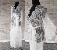 Off-white luxurious wedding robe, to add a perfect touch to your perfect and unique day. Only high quality fabrics and high finishing used for making the robe as neat as it can be. Please find the wedding robes collection here https://www.etsy.com/shop/LidiasBoutiqueDesign?ref=seller-platform-mcnav&section_id=25023222. For wedding dresses, please access https://www.etsy.com/shop/LidiasBoutiqueDesign?ref=seller-platform-mcnav§ion_id=23157290. For wedding tops and boleros, please access https: Elegant Long Sleeve Lace Sleepwear, Feminine Lace Gown With Delicate Details, Lace Wedding Night Dress, Feminine Lace Gown With Lace Trim, Feminine Lace Wedding Robe, Fitted Long Sleeve Lace Sleepwear, Lace Back Gown For Wedding Night, Lace Patchwork Gown For Wedding Night, Elegant Sheer Robe For Party