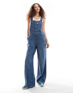 Jumpsuits & Playsuits by Lee Minimal effort, maximum payoff Classic dungarees design Adjustable buckle straps Buttoned sides Functional pockets Wide leg Relaxed fit Dungry Outfits Women, 70s Dungarees, Cute Dungaree Outfits, Dungaree Outfits, Dungarees Outfit, Cute Dungarees, Form Outfits, Leggings Sale, Brunch Outfit