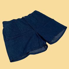 "Vintage denim shorts, manufactured ca. 1970s, still with the original tags attached. Moonshine (Lane & Bryant) brand plus size women's shorts in size 44 (could be worn fashionably by either gender today).     - Brand: Moonshine (Lane & Bryant)    - Size: Size 44    - Time Period: 1970s    - Color(s): Denim blue    - Materials: 100% cotton    - Made in: Made in USA    - Condition: In new old stock, vintage condition with original tags (this piece was stored in a dresser after purchase and never Retro Wide Leg Cotton Shorts, Retro Denim Bottoms With Built-in Shorts, Retro Short Denim Shorts, Retro High Waist Denim Shorts, Retro High-waist Denim Shorts, Retro Short Leg Bottoms With Pockets, Retro Bottoms With Pockets And Short Legs, Retro High-waisted Jean Shorts With Built-in Shorts, Retro High Waist Jean Shorts With Built-in Shorts