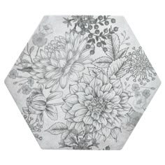 a black and white drawing of flowers on a hexagon