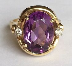 14k Yellow Gold Oval Faceted Amethyst and Diamond Ring   | eBay Oval Amethyst Ring Stamped 14k, Oval Amethyst Ring With Gemstone Accents For Formal Occasions, Heirloom Style Purple Oval Amethyst Ring, Classic Oval Amethyst Ring With Accent Stones, Oval Amethyst Collectible Ring, Oval Amethyst Ring For Formal Occasions, Oval Hallmarked Amethyst Ring For Formal Occasions, Formal Oval Amethyst Ring In Fine Jewelry Style, Formal Oval Amethyst Ring Hallmarked