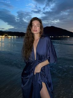 Shop comfort and elegance with our Goddess Kaftan Maxi Dress. This navy hand-dyed kaftan features a flowy Beachwear V-neck Maxi Dress For Date Night, Elegant V-neck Midi Dress For Beach Cover-up, Beachwear Maxi Dress For Date Night With V-neck, Beachwear V-neck Midi Dress For Party, Elegant Summer Maxi Dress For Night, Summer Evening Open Front Maxi Dress, Elegant V-neck Maxi Dress For Night, Summer Night Maxi Length Dress, Elegant Open Front Night Dresses