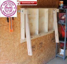 the inside of a building with plywood walls and shelving