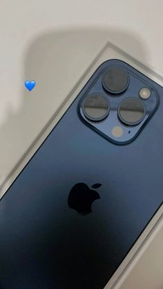 an apple iphone 11 is shown with the camera facing up and two buttons on each side