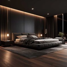 a large bed sitting on top of a wooden floor next to a night stand with two lamps