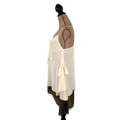 This layered dress features spaghetti straps crossed at the back and a romantic boho, mori vibe. The lace applique on the bodice and side ties also add a 20's style flapper feel to this unique loose fitting chemise. I love the creamy beige and brown combo and the high low hemline. Also available in Blue/Gray here: https://www.etsy.com/listing/656680524/romantic-clothes-layered-dress-boho-mini?ref=shop_home_active_7 Each piece in our HEART ALTERED collection has been embellished with our signatur Lace Camisole For The Beach, Bohemian Sleeveless Dress For Layering, Bohemian Spaghetti Straps Camisole For Summer, Bohemian Camisole With Adjustable Straps, Bohemian Lace Trim Camisole For Vacation, Bohemian Camisole With Lace Trim For Vacation, Lace Cami Camisole For The Beach, Lace Camisole With Spaghetti Straps For The Beach, Summer Bohemian Dresses For Layering