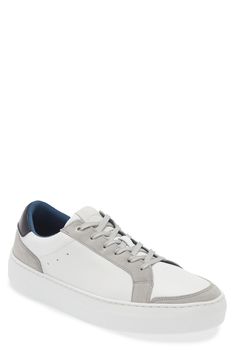 Classic and versatile, this low-slung sneaker made of leather and suede features color-pop detailing and an easy, wear-everywhere vibe. Lace-up style Leather upper and lining/rubber sole Imported Modern Gray Sneakers With Contrast Sole, Gray Leather Sneakers With Vulcanized Sole, Modern Low-top Sneakers With Contrasting Heel Counter, Casual Leather Sneakers With Contrasting Heel Counter, Casual Leather Sneakers With Contrasting Heel, Sneaker Men, Up Styles, Easy Wear, Size 13