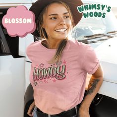 Welcome to Whimsy's Woods! 🌿✨ Embrace the rustic charm with our Retro Howdy T-shirt! Featuring a classic Western style and Southern charm, this Comfort Colors tee is perfect for anyone who loves vintage vibes and country flair. Whether you're going for a chic cowgirl look or a laid-back Southern vibe, this shirt will add a touch of retro fun to your wardrobe. It also makes a great gift for anyone who appreciates Western fashion. 🐸 DETAILS 🐸 Each shirt is crafted with care to deliver a perfect blend of comfort and style. Ideal for casual outings, festivals, or simply expressing your love for country life. Features: Soft, premium Comfort Colors fabric Durable and long-lasting Available in multiple colors and sizes Unisex fit for all Western-inspired design Please note: Due to display diff Chic Cowgirl, Cowgirl Look, Western Tee, Cow Girl, Comfort Colors Tee, Southern Charm, Retro Tshirt, Graphic Shirt, Vintage Vibes