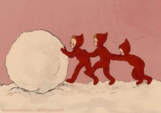 three people in red suits are pushing a snowball up the side of a hill