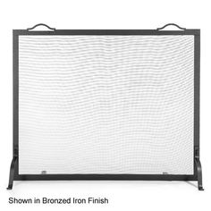 a black fireplace screen with mesh panels on the top and bottom, in front of a white background