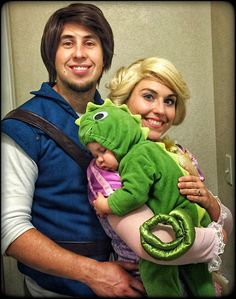 a man and woman are dressed up as disney characters