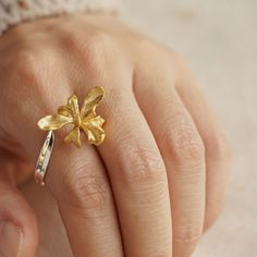 "Iris often appears in the paintings of Monet and Van Gogh. It is a symbol of light and freedom, and a flower full of romantic artistic atmosphere. Not too small or big, our Iris ring design has been handcrafted with feather lightweight in order to pamper your delicate finger. Like the rainbow, this ring will bring out the colorful side of your style while enhancing and accentuating other accessories you pair them with. MEASUREMENTS Flower diameter:approx.2 cm/0.79 inches Original size: US size Artistic Flower Jewelry For Wedding, Artistic Flower Jewelry For Weddings, Van Gogh Jewelry, February Birth Flower, Iris Ring, February Birth Flowers, Antique Silver Jewelry, Gold Elephant, Iris Flower