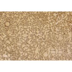 an intricate carved wooden panel with animals and people