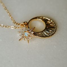 Our Astro Necklace is the perfect necklace for the galaxy lover! This delicate necklace features a gorgeous opalite star & sunbeam pendant that are so gorgeous together! Everyone will be asking you... where did you get that necklace?FEATURES White cubic zirconia and opalite star charm set in 16K gold plating Sun beam pendant (16k gold plated) 14k yellow gold-filled chain All necklace findings (clasp, jump rings, & tag) are 100% gold-filled to ensure the highest quality piece Model is wea Pretty Jewelry Necklaces, Theodore Roosevelt, Celestial Jewelry, Charm Set, Pretty Earrings, Opal Necklace, Delicate Necklace, Jewelry Packaging, Star Charms