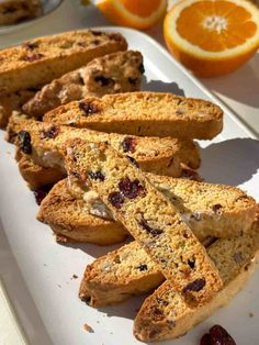 slices of orange and cranberry bread on a plate