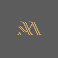 the letter n is made up of two lines and gold foil on a gray background