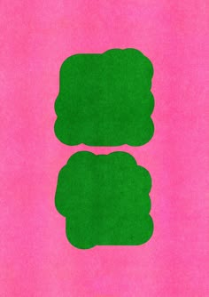 two pieces of green paper with pink background