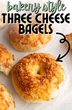 three cheese bagels are shown on a paper towel with the words bakery style three cheese bags