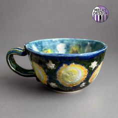 handmade ceramic mug with sun moon stars pattern - blue, yellow, white, orange, green Ceramic Sun And Moon, Sun Mug, Ceramic Sun, Ceramic Eye, Witch Board, Clay Bowl, Candle Plate, Sun Moon Stars, New Ceramics