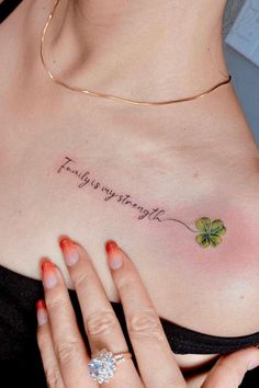 a woman's chest with an inscription on it