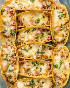 an overhead view of several stuffed shells filled with meat and cheese