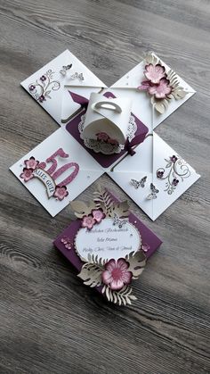 some cards with flowers and butterflies on them