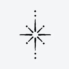 a black and white photo of a snowflake with dots in the shape of a star